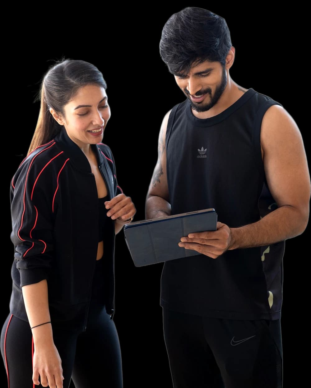 A fitcru coach reviewing a client's progress on a tablet